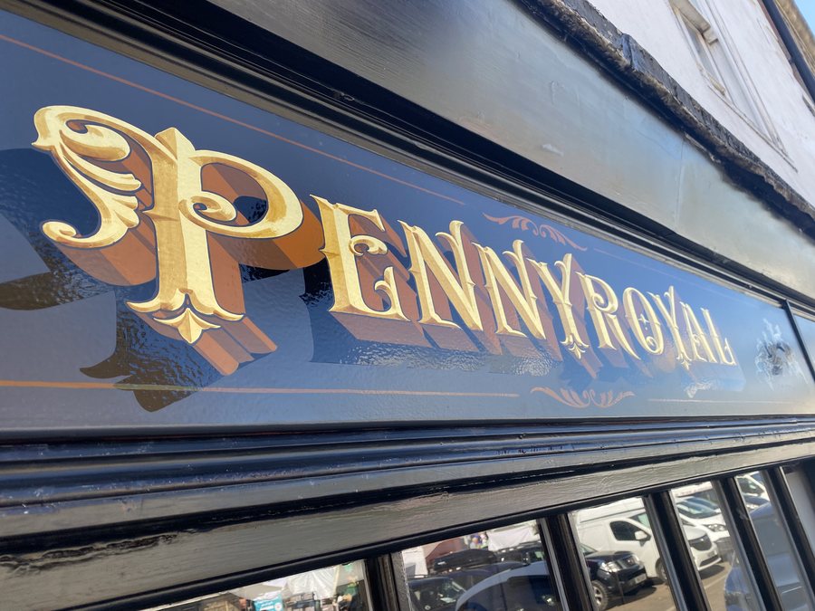 Gilded lettering on the Pennyroyal shopfront